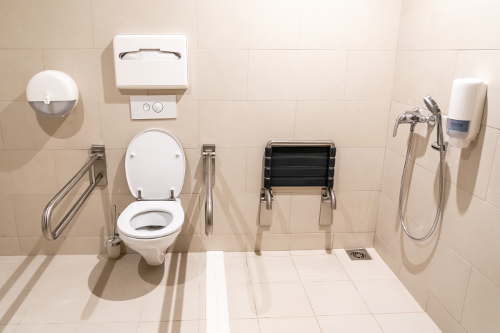 Exploration of Microbial Communities in Hospital Bathrooms Reveals Antibiotic Exposure Selects for Enterococcus Over Commensal Taxa